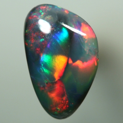 SOLID BLACK OPAL Bright red and turquoise rolling flashes
